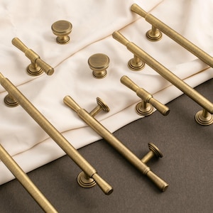 May include: A rustic wooden sign with the text "Welcome to our home" in white lettering. The sign features a distressed finish and a simple, inviting design, perfect for entryway decor.