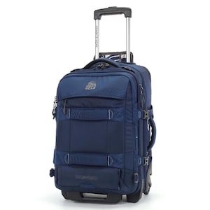 May include: A navy blue rolling suitcase with a retractable handle. The luggage has multiple compartments, straps, and a logo that reads "Granite Gear". The suitcase is designed for travel and has wheels for easy transport.