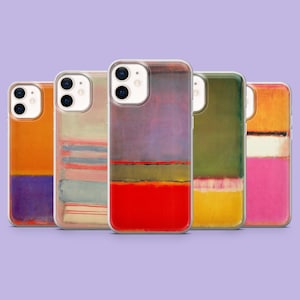 May include: Five phone cases with abstract art designs. The cases feature a variety of colors, including orange, purple, red, green, and yellow. Each case has a clear border and a glossy finish. The designs resemble color field paintings.