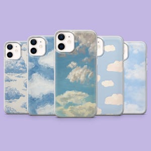 May include: Five smartphone cases arranged in a row, each featuring a unique artistic depiction of a blue sky with white clouds. The designs vary from painterly, textured brushstrokes to soft, minimalist cloud patterns on light blue backgrounds.