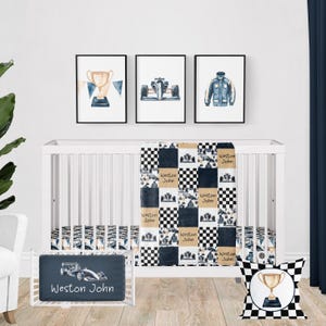 May include: A black and white checkered crib bedding set with a blue and gold race car theme. The set includes a crib sheet, a quilt, a bumper, and a pillow. The quilt features a checkered pattern with blue and gold race cars and the words "Weston John" repeated throughout. The pillow features a black and white checkered pattern with a gold trophy in the center. The bumper features a black and white checkered pattern with a blue and gold race car in the center. The crib sheet features a black and white checkered pattern with a blue and gold race car in the center.