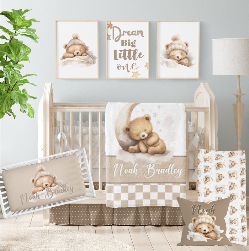 May include: A nursery set with a teddy bear theme, including a cot, bedding, and wall art. The set features a cot, a blanket with a teddy bear on a moon, a pillow, and framed art prints. The colour scheme is soft beige and brown.