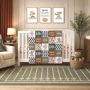 May include: A patchwork baby blanket featuring a football theme with illustrations of teddy bears in jerseys, footballs, and black helmets. The blanket includes the text Charlie Taylor and the number 10 in a repeating grid pattern of green, brown, and white.