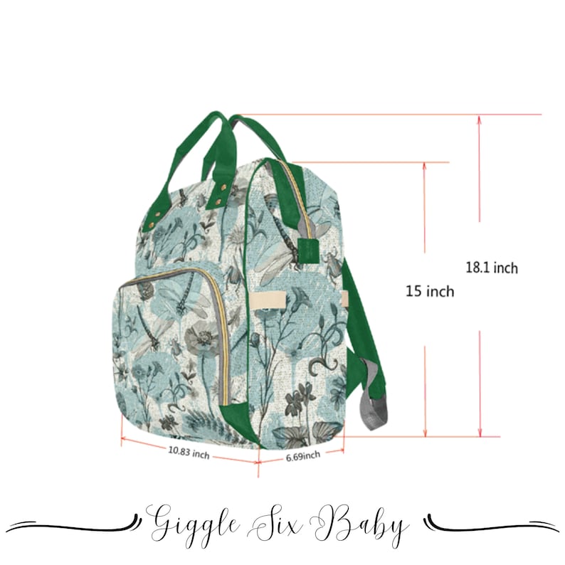 May include: A green and blue patterned diaper bag with a zipper closure and adjustable straps. The bag measures 18.1 inches tall, 15 inches wide, and 10.83 inches long. It has a dragonfly and floral design.