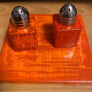 Hand painted salt & pepper shaker set with complementary trivet