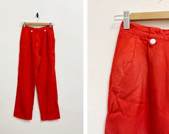 Vintage 80s red pants with white button detail / 25" Waist