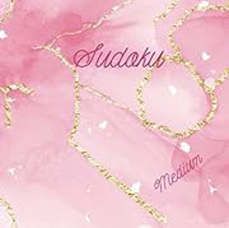 May include: A pink and white Sudoku puzzle book with gold accents. The cover features the word "Sudoku" in cursive script and "Medium" in a smaller font. The background has a watercolor effect.