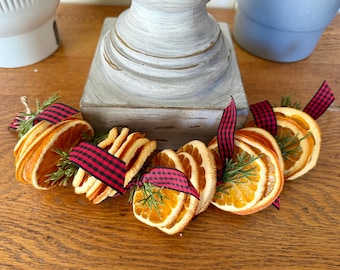 Guirnalda de rodajas de naranja hecha a mano