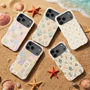 May include: Five smartphone cases with various floral and grid patterns in pastel colours. Each case features a rectangular camera cutout with three circular lenses. The designs include patchwork squares, diamond grids, and small flower motifs.