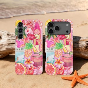 May include: Two phone cases with a pink watercolour design featuring tropical cocktails, a surfboard, starfish, and the text "Coastal Life." The cases are on a sandy beach with a starfish and driftwood.