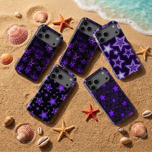 May include: Four rectangular smartphone cases with triple camera cutouts, each featuring a dark purple and black background with various star patterns, including solid purple stars, outlined stars, and swirling star designs on a sandy beach.