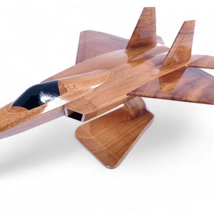 Handcrafted F-22 Raptor Wood Replica Airplane - Beautiful All-Wood Display Unit for Pilots and Aviation Enthusiasts!