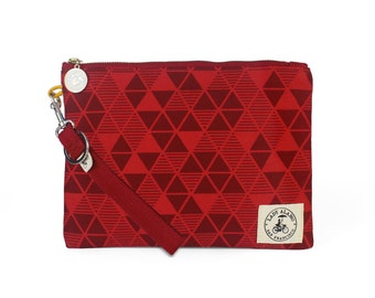 Miss Zip Wristlet in Pyramid Red Print With Water Repellent Lining. Washable Fabric. Handmade in San Francisco USA