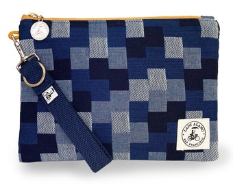 Miss Zip Wristlet in Denim Patchwork With Water Repellent Lining. Washable Fabric. Handmade in San Francisco USA