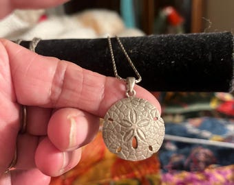 Sterling Sand Dollar fuso davanti e dietro