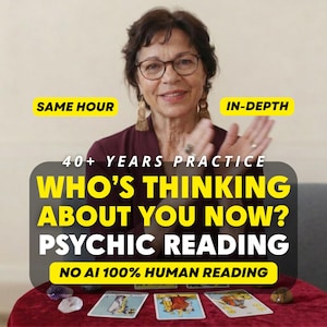 May include: A person with dark hair and glasses wearing a maroon top, with text overlays reading SAME HOUR, IN-DEPTH, 40+ YEARS PRACTICE, WHO'S THINKING ABOUT YOU NOW? PSYCHIC READING, and NO AI 100% HUMAN READING, with tarot cards on a red surface.