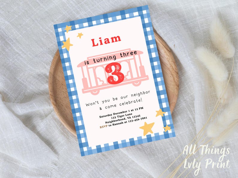 May include: A birthday invitation with a blue and white gingham border. The invitation features the name "Liam" in red, the phrase "is turning three", and a trolley graphic. Additional text includes party details and RSVP information.