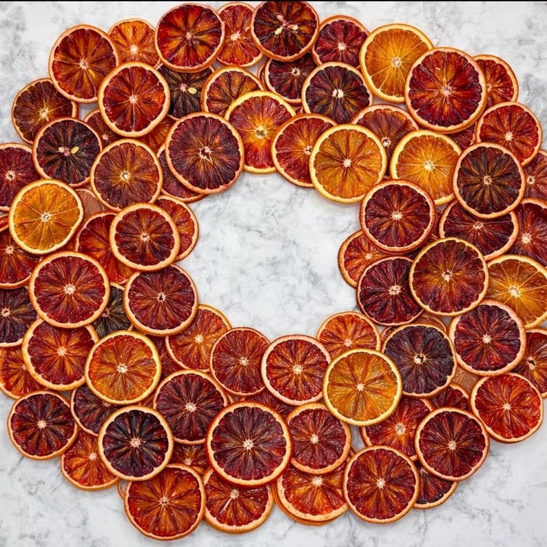 blood oranges in bulk styled as a wreath