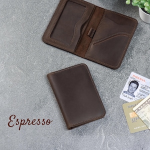 Espresso leather minimalist wallet displayed with ID and folded bills