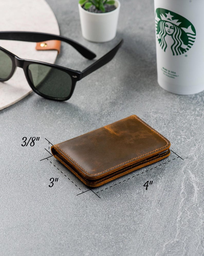 Personalization chart showing monogram and symbol options for custom leather wallet