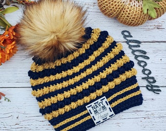 Crocheted Navy Mom Chalmers Street Beanie in Navy Blue and Gold with Ginger Faux Fur Pom