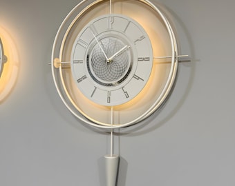 Reloj de pared extragrande de metal plateado, diseño moderno en espiral con LED, reloj silencioso retroiluminado.