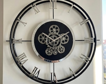 Reloj de pared industrial de gran tamaño con engranajes - Metal negro, números romanos, 24 pulgadas