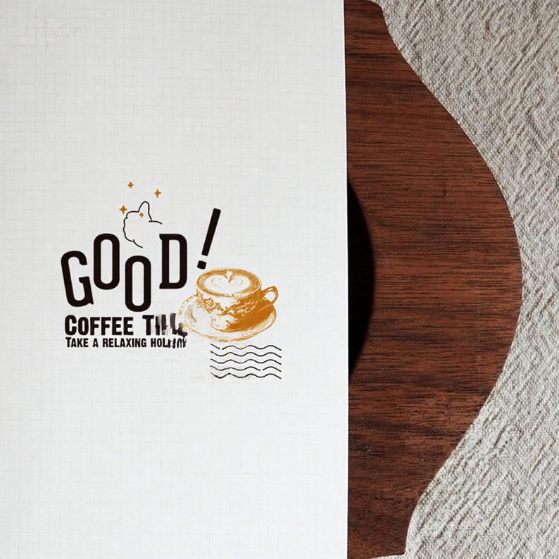 May include: A white grid paper sheet featuring a black and orange graphic print. The design includes the text GOOD! COFFEE TIME TAKE A RELAXING HOLIDAY, a thumbs-up icon, a detailed illustration of a coffee cup on a saucer, and wavy line patterns.