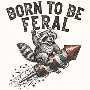 May include: A black and white illustration of a raccoon riding a red, white, and blue rocket. The text "BORN TO BE FERAL" is above the raccoon. Stars and smoke trails are also included in the design.