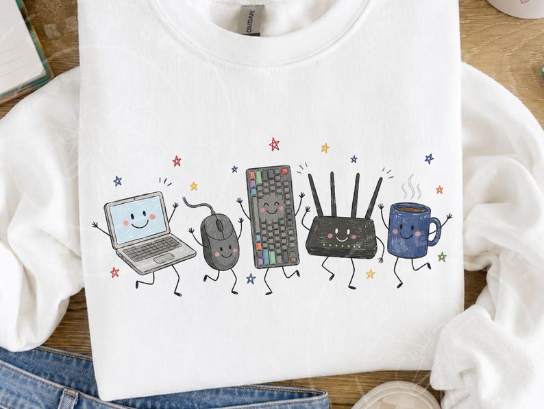 May include: A white crewneck sweatshirt featuring a graphic print of five anthropomorphic items: a laptop, a computer mouse, a mechanical keyboard, a Wi-Fi router, and a blue coffee mug, all surrounded by small colorful stars.