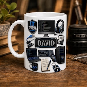 May include: A white ceramic mug featuring IT-themed graphics including a computer monitor with code, a headset, a hard drive, a keyboard, a mouse, a laptop, a notebook with the text Problem Solve Deploy Repeat, and a tag labelled IT SUPPORT.