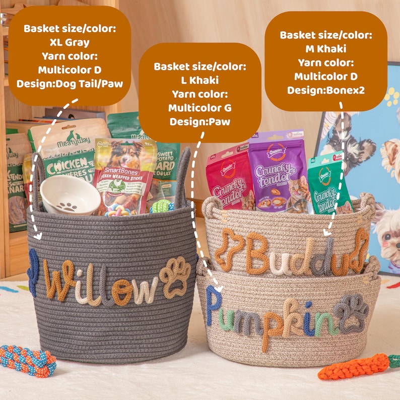 May include: Three woven pet baskets in grey and khaki, filled with treats and toys. The grey basket has "Willow" and a paw print, the khaki baskets have "Buddah" and "Pumpkin" with bone and paw designs. The baskets are labelled with size, colour, and design details.