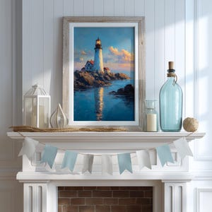 May include: A framed print of a lighthouse on a rocky coast, reflecting in the water. The artwork is displayed on a white mantel with decorative elements, including a blue glass bottle, candles, and a banner of blue and white flags.