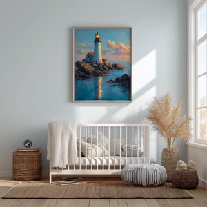 May include: A framed painting of a lighthouse on a rocky coast, reflecting in the water. The artwork features a white lighthouse with a red-roofed building, set against a blue sky with pink and orange clouds. The painting is displayed above a white crib.