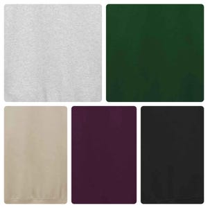 May include: A collection of fabric swatches in various colors. The swatches include a light gray, dark green, beige, deep purple, and black. The fabrics appear to be smooth and solid in color, suitable for apparel or home decor.