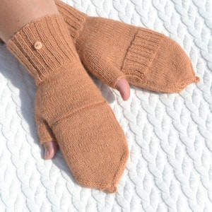 Light bown alpaca half finger convertible gloves with mitten flaps on model's hands