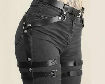 Leather harness at the waist and thighs, thigh boots, harness belt