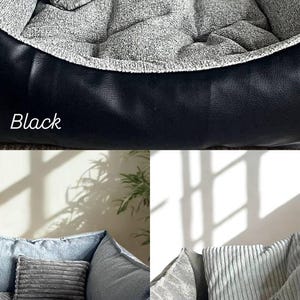 May include: A black dog bed with a gray interior and a bone-shaped pillow. The bed has a black leather-like exterior and a soft, textured gray fabric inside. The word "Black" is written on the image.