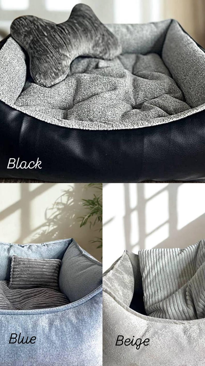 May include: A black dog bed with a gray interior and a bone-shaped pillow. The bed has a black leather-like exterior and a soft, textured gray fabric inside. The word "Black" is written on the image.