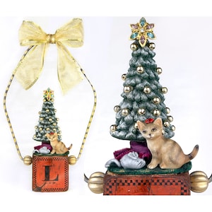 assemblage art,ornament mixed media,found object, cat, Christmas tree, mouse, toy block, wood block,