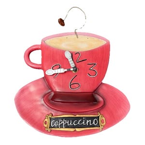May include: A whimsical, red cappuccino-themed ornament shaped like a coffee cup and saucer. The cup features a clock face with the hands pointing to 9:20. The saucer has a decorative sign that reads "cappuccino". A coffee bean hangs from a wire.