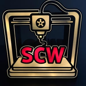 May include: A gold and black 3D printer logo with the letters "SCW" in red. The logo features a stylized 3D printer design with a gear symbol and a nozzle. The background is dark.