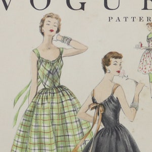 May include: A vintage Vogue sewing pattern envelope, number 8476, size 14, featuring illustrations of a green plaid dress and a solid black dress with a back bow. The cover includes text: Vogue Pattern, 8476, 75c, 32 bust, 35 hip, and 1955 copyright.