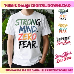 May include: White t-shirt with the text "STRONG MIND. ZERO FEAR." in various colors. The design includes green, blue, orange, and black lettering. Additional design variations are shown on the right. The shirt is part of a digital download.
