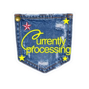 May include: A blue denim pocket sticker featuring the yellow text Currently processing. The design includes a gold rivet, a red and white star, and three yellow stars. The denim fabric has a distressed, frayed texture with visible stitching.