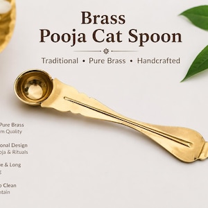 May include: A gold-colored brass spoon with a round bowl and a decorative handle. The text on the image reads: Brass Pooja Cat Spoon, Traditional, Pure Brass, Handcrafted, 100% Pure Brass Premium Quality, Traditional Design for Pooja & Rituals, Durable & Long Lasting, Easy to Clean & Maintain, and Handmade with Care.