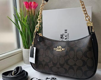 Borsa a tracolla Teri — Tela esclusiva con dettagli neri e marroni