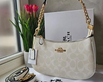 Teri Shoulder Bag — Signature Leather with Ivory Accents and Gold Hardware