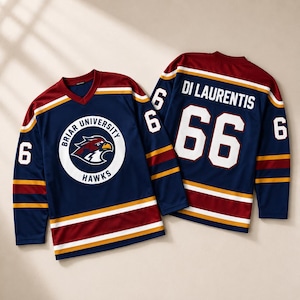 May include: Two navy blue hockey jerseys with maroon and gold stripes on the sleeves and hem. The front features a circular logo with a hawk and the text Briar University Hawks. The back displays the name Di Laurentis and the number 66 in white.