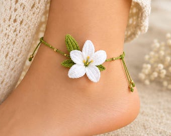 Armband/enkelbandje met leliebloem